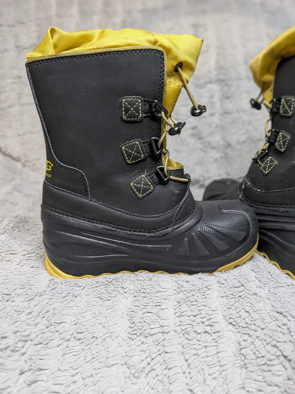 UGG Kids Black and Yellow Snow Boots Size 1